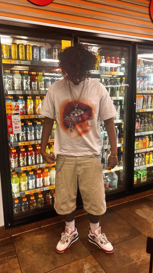 Customer wearing Outcast Apparel products