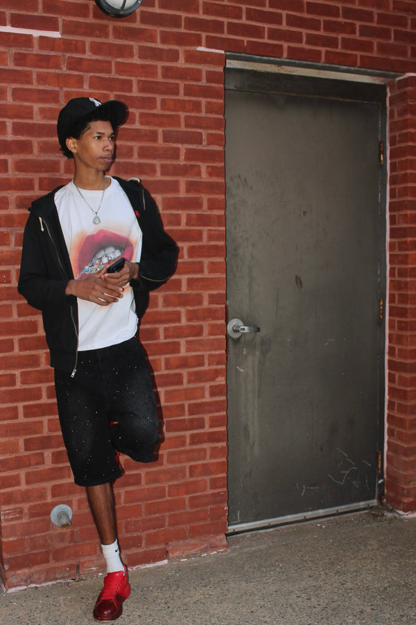 Customer wearing Outcast Apparel products